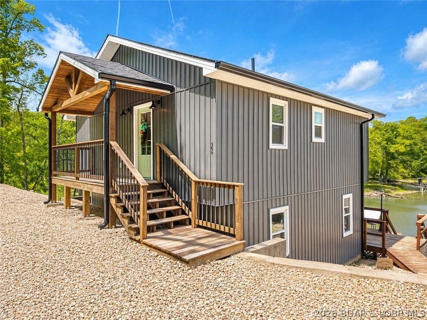 Cove location with 100 feet of lakefront, this beautifully - photo 31