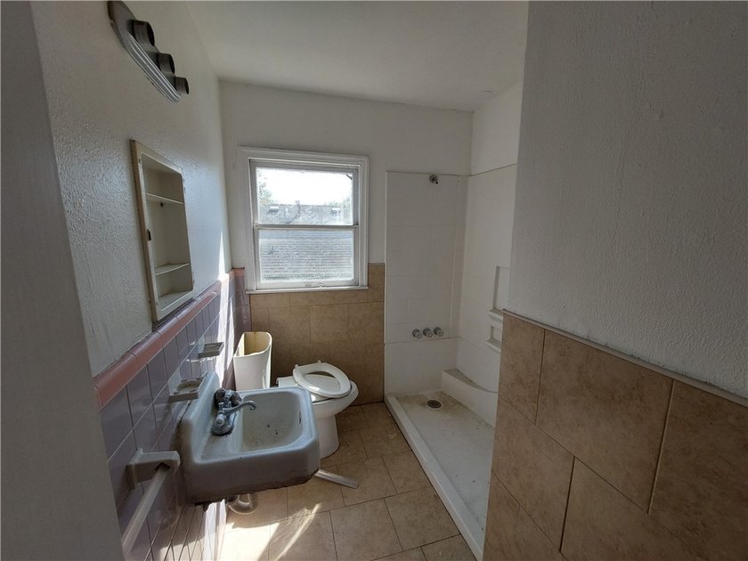 Prime Investor Opportunity: 3-Unit Fixer-Upper with Value-Add - photo 9