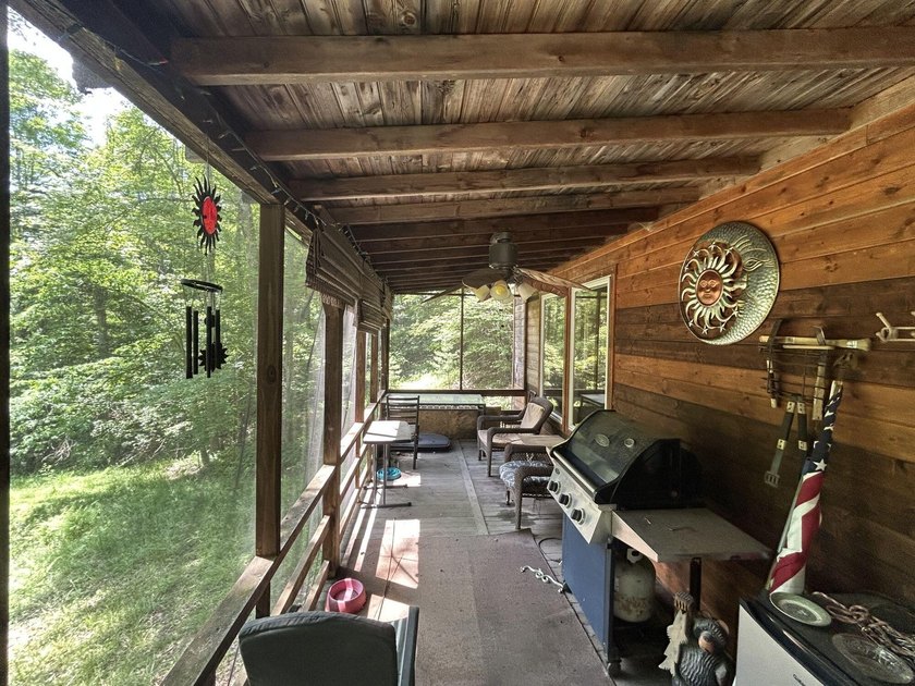 Escape to the serenity of the mountains with this charming cabin - photo 19