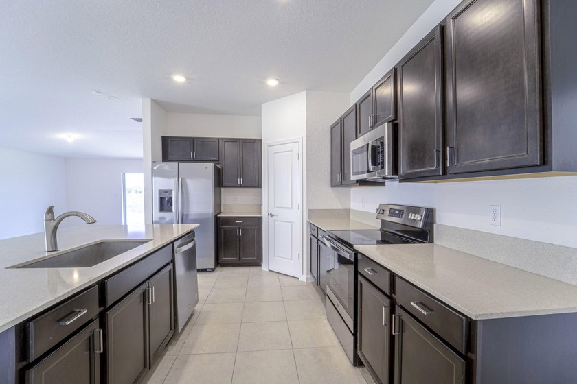 Beautiful updated 4 bedroom home in a gated community. New - photo 9