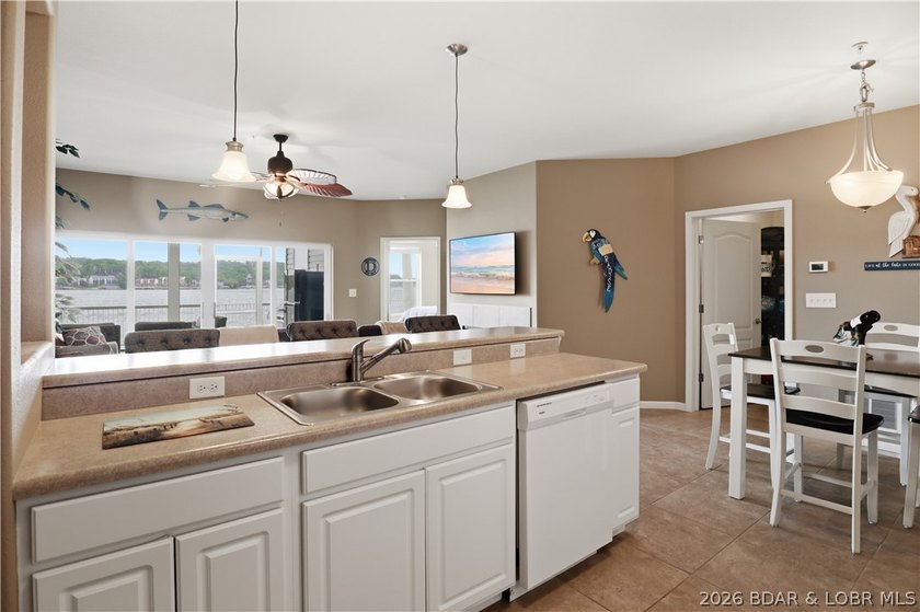 Experience elevated lake living in this rare lakefront condo - photo 11