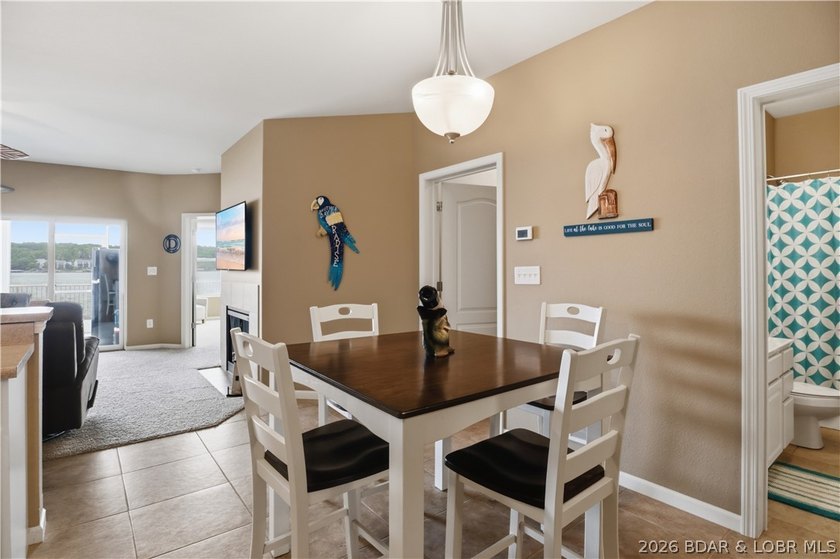 Experience elevated lake living in this rare lakefront condo - photo 12