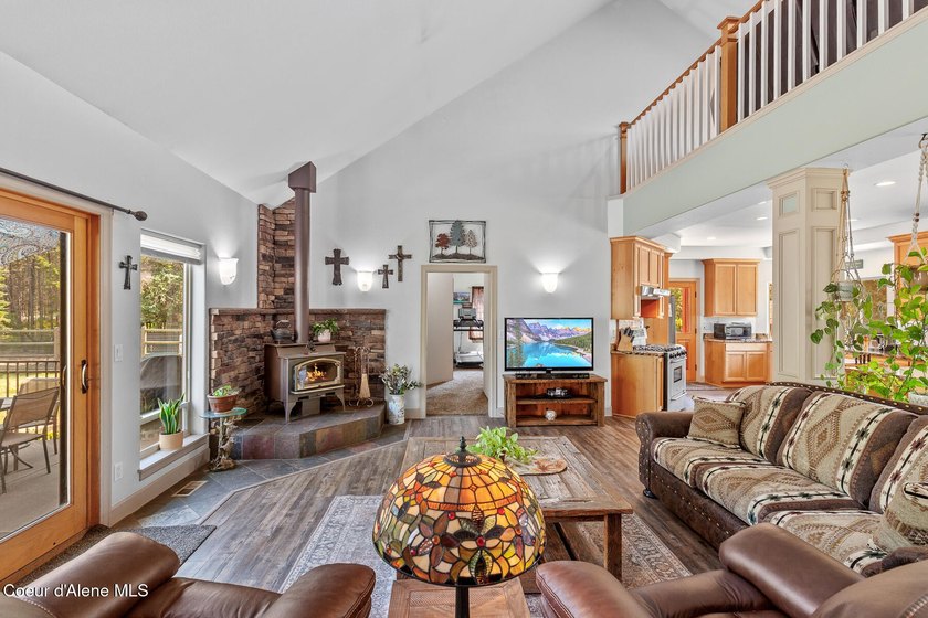 Beautiful 2,738SF Rancher on 9.91 treed, level, horse-friendly - photo 2