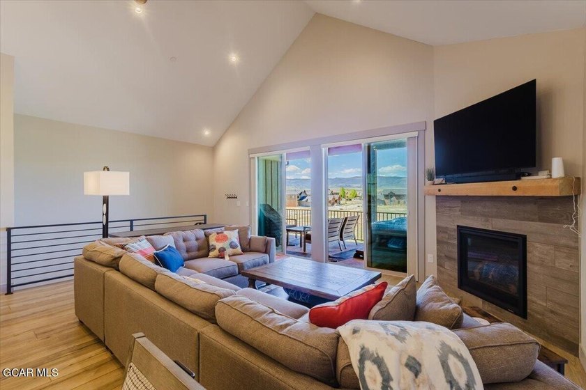 Overlooking Grand Elk Golf Course, this stunning fully furnished - photo 22