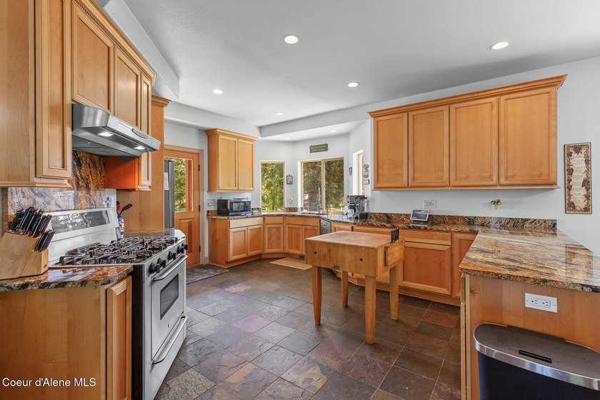 Beautiful 2,738SF Rancher on 9.91 treed, level, horse-friendly - photo 4