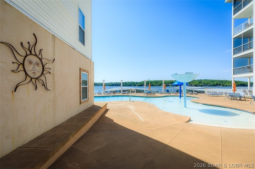 Experience elevated lake living in this rare lakefront condo - photo 29