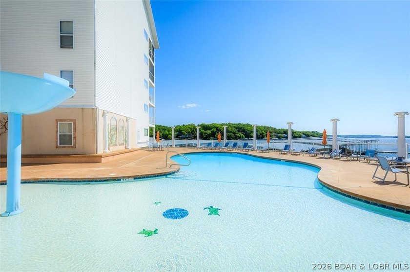 Experience elevated lake living in this rare lakefront condo - photo 31