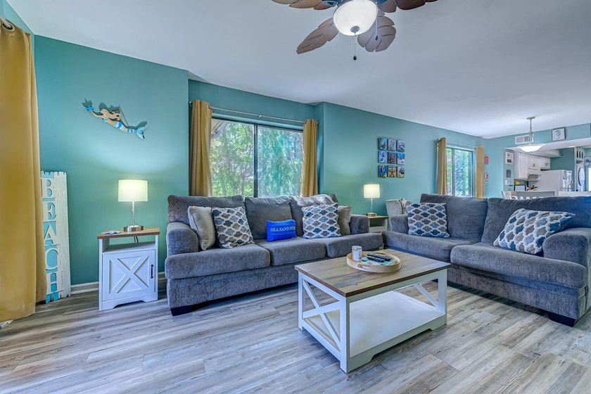 Relax in the large 3rd floor end unit with an Oceanview. The - photo 11