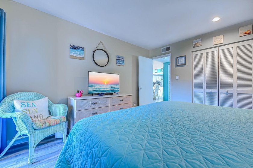 Relax in the large 3rd floor end unit with an Oceanview. The - photo 16