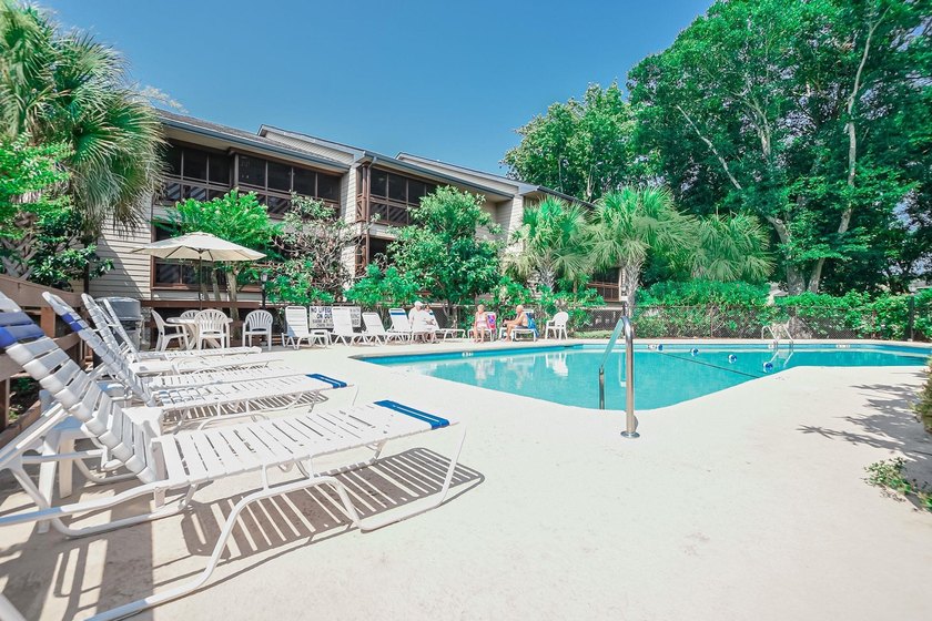Relax in the large 3rd floor end unit with an Oceanview. The - photo 27