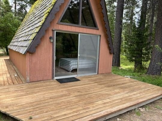 The main A-frame house and two smaller A-frame cabins over - photo 15