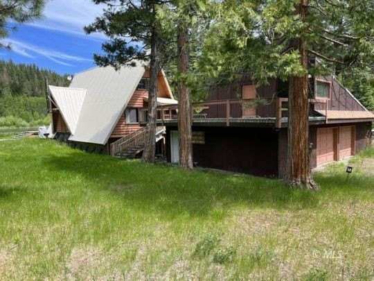 The main A-frame house and two smaller A-frame cabins over - photo 21