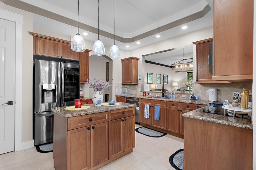 Located in the highly sought-after gated community of Regatta - photo 12