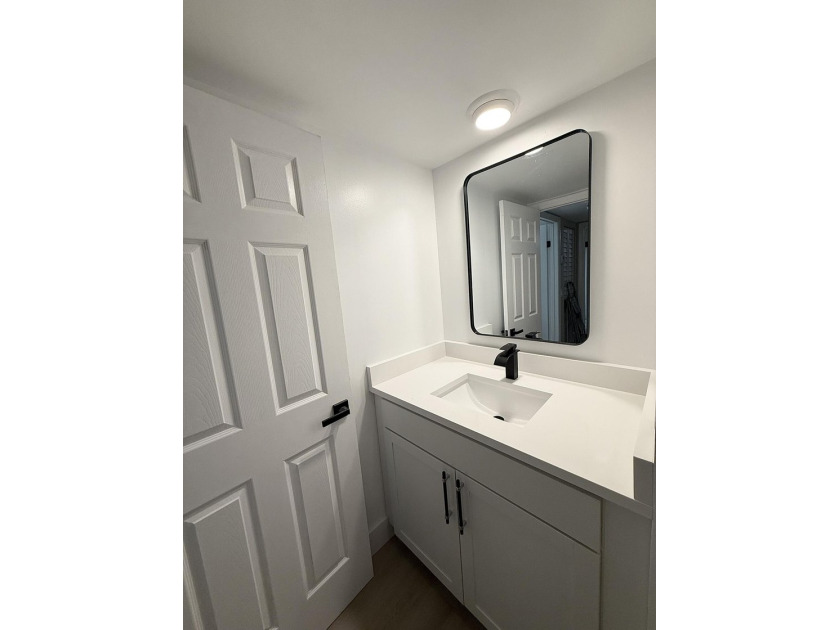 Beautifully renovated townhome, updated top to bottom, with - photo 11