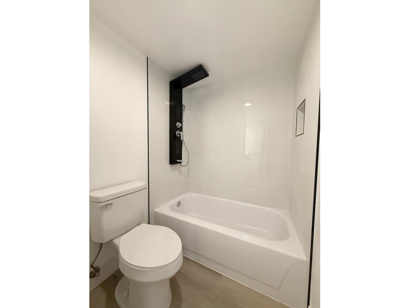 Beautifully renovated townhome, updated top to bottom, with - photo 13