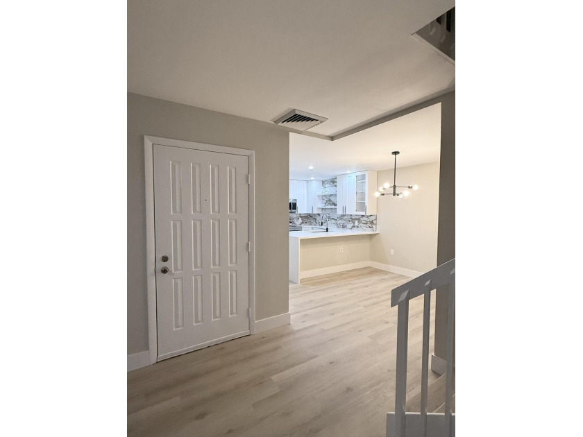 Beautifully renovated townhome, updated top to bottom, with - photo 16
