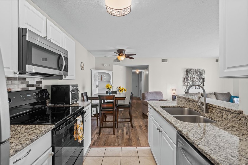 Welcome to this charming 2-bedroom, 2-bathroom condo located - photo 15