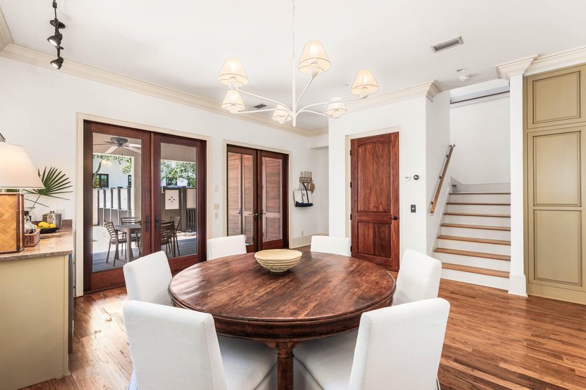 This timeless, Rosemary Beach home offers an inviting covered - photo 15