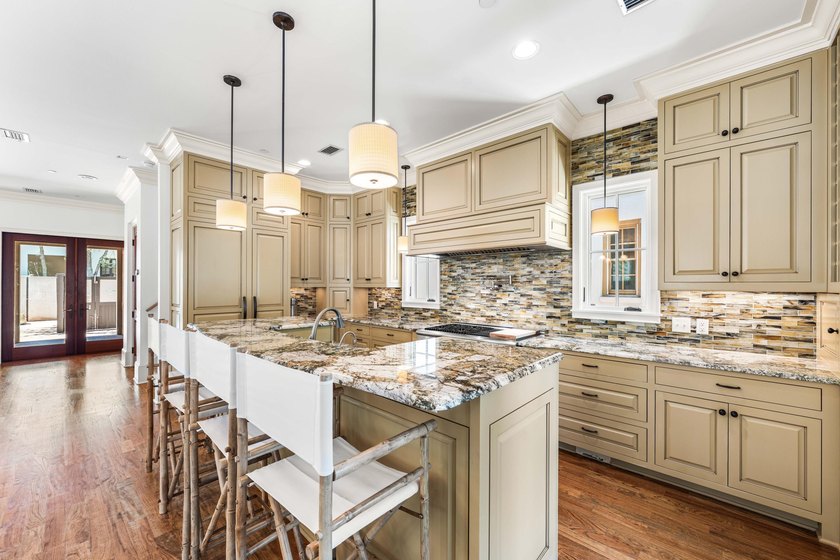 This timeless, Rosemary Beach home offers an inviting covered - photo 17