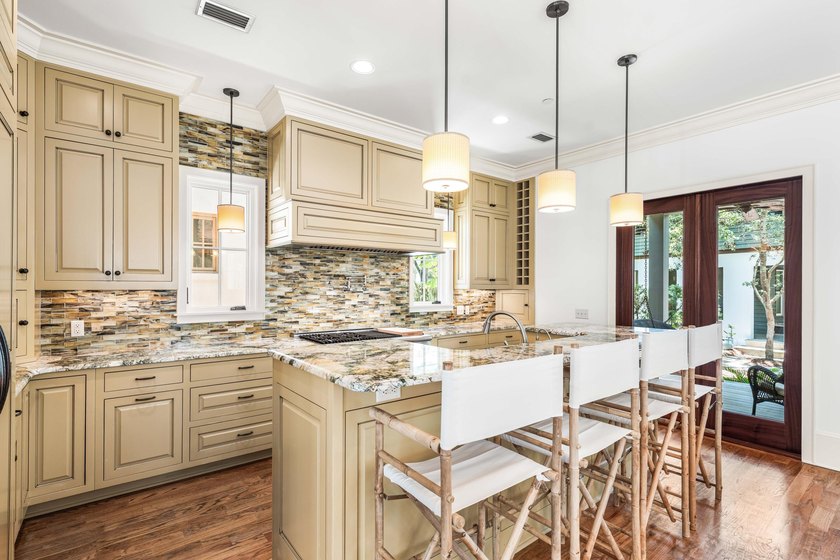 This timeless, Rosemary Beach home offers an inviting covered - photo 18