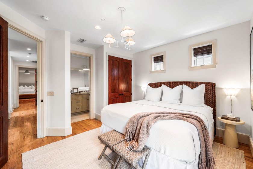 This timeless, Rosemary Beach home offers an inviting covered - photo 25