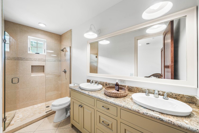This timeless, Rosemary Beach home offers an inviting covered - photo 32