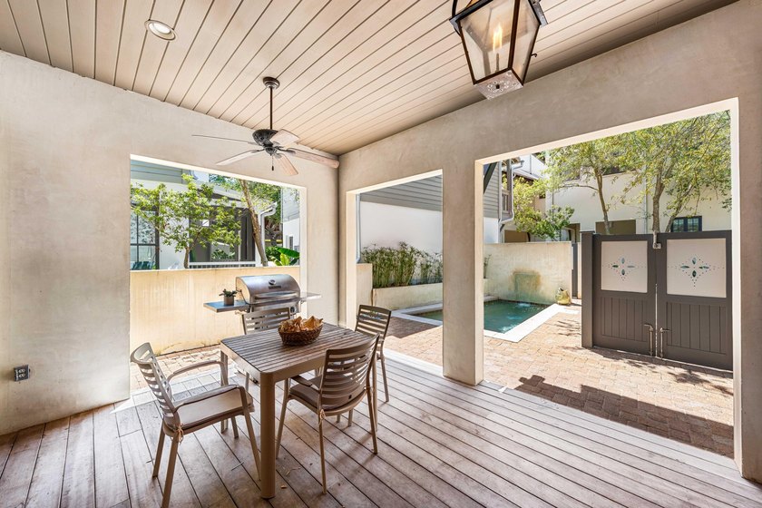 This timeless, Rosemary Beach home offers an inviting covered - photo 49
