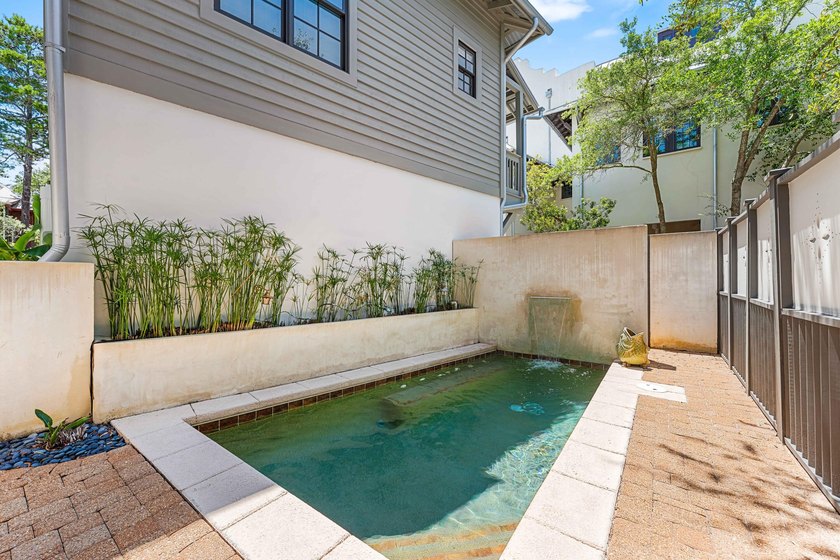 This timeless, Rosemary Beach home offers an inviting covered - photo 50