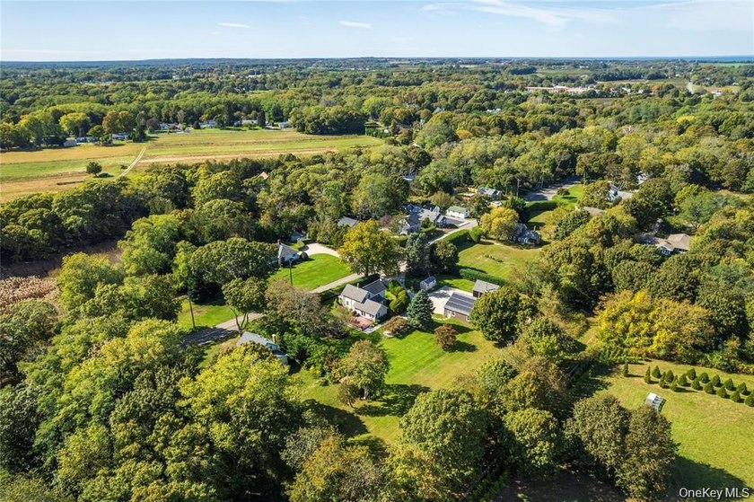 Set on 1.16 acres of beautifully landscaped and private grounds - photo 3
