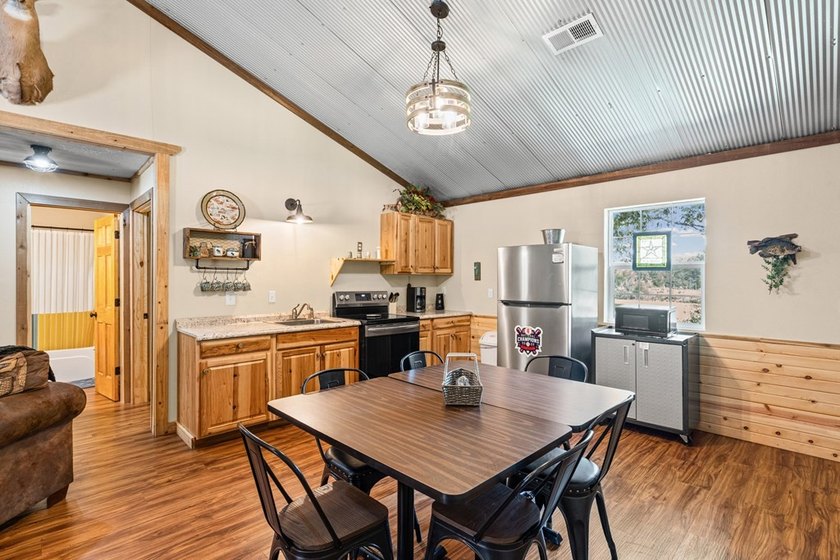Rare opportunity to own a fully furnished duplex on - photo 9