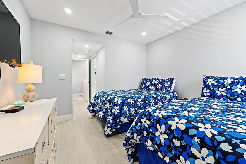 Welcome to this charming 2-bedroom, 2.5-bath condominium in the - photo 23