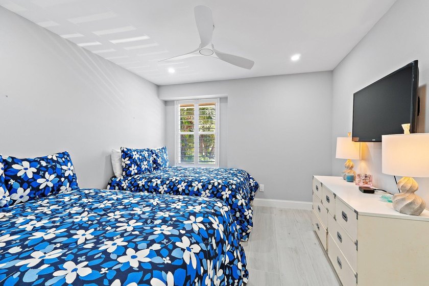 Welcome to this charming 2-bedroom, 2.5-bath condominium in the - photo 24