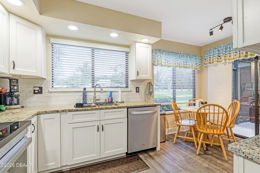 Welcome to easy, elevated living inside the Spruce Creek Fly-In - photo 11