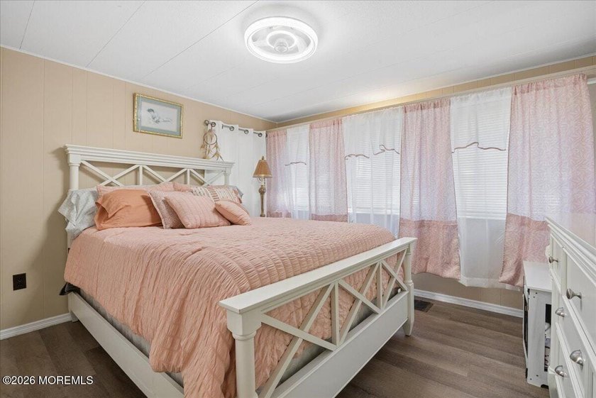 Welcome home! This stylish mobile home offers two bedrooms, a - photo 13