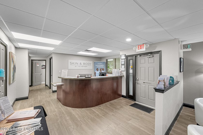 Turnkey +/-2,800 SF medical office condo in the well-maintained - photo 4