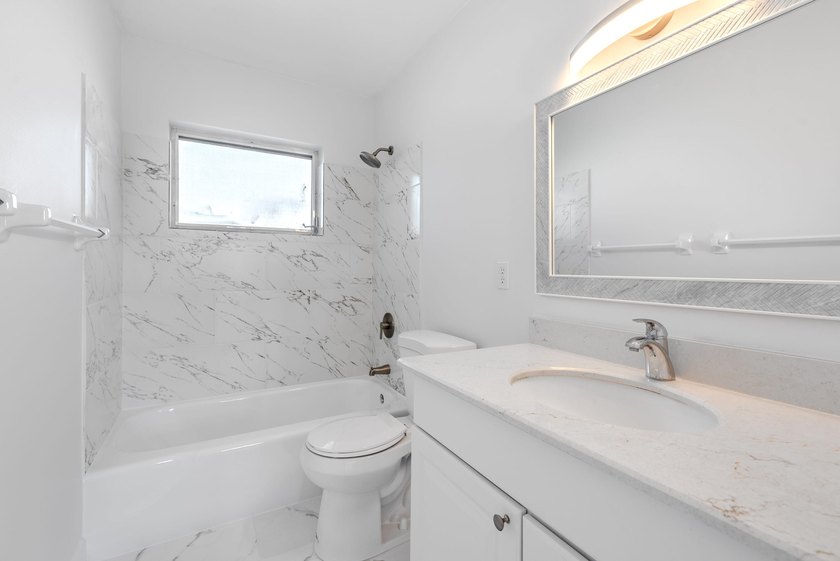 1 bedroom 1.5 baths. Fully remodeled. Enjoy vibrant living in - photo 7