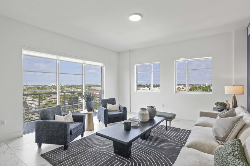 Perched high above the heart of Downtown Boca Raton, this - photo 5