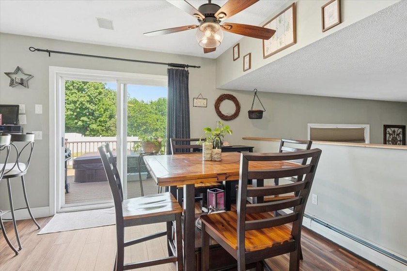 Set on 1.17 private acres in the heart of Grand Isle, this - photo 12