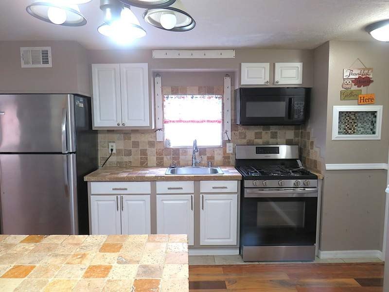 This charming 840 square feet manufactured home built in 1978 by - photo 2