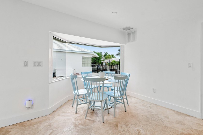 Welcome to this exceptional single-story waterfront residence in - photo 14