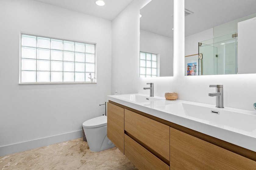 Welcome to this exceptional single-story waterfront residence in - photo 17