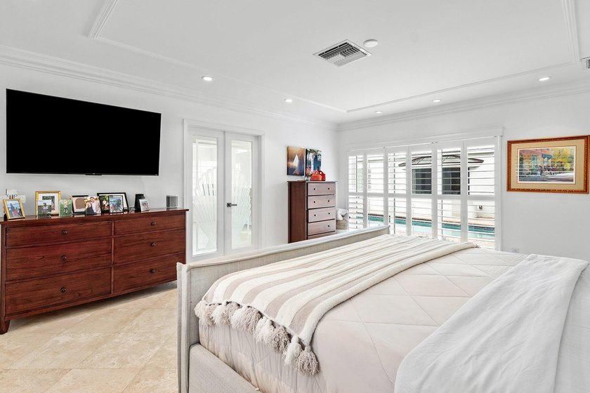 Welcome to this exceptional single-story waterfront residence in - photo 20