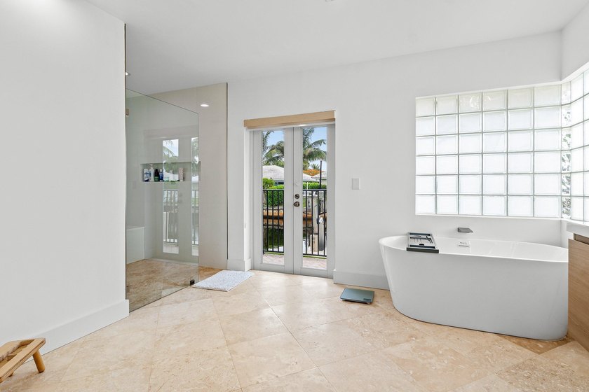 Welcome to this exceptional single-story waterfront residence in - photo 22