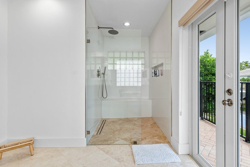 Welcome to this exceptional single-story waterfront residence in - photo 23