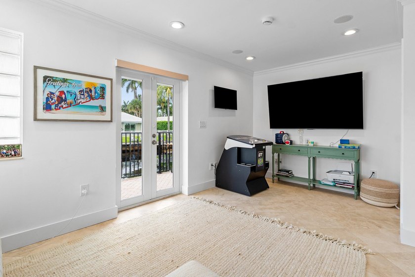 Welcome to this exceptional single-story waterfront residence in - photo 25