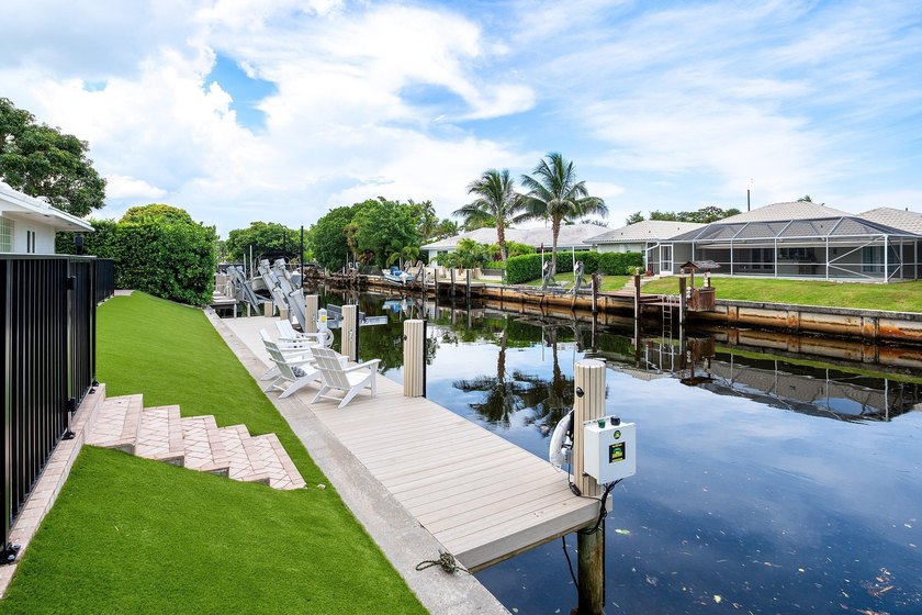 Welcome to this exceptional single-story waterfront residence in - photo 30