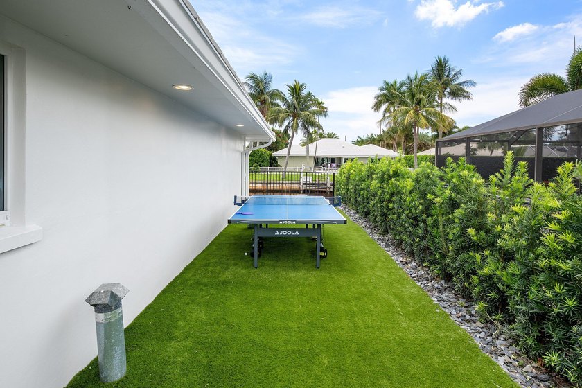 Welcome to this exceptional single-story waterfront residence in - photo 32