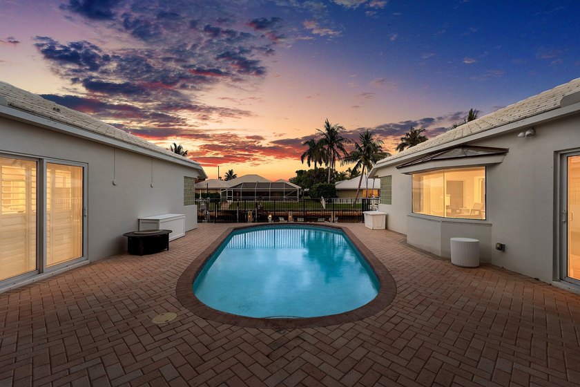 Welcome to this exceptional single-story waterfront residence in - photo 50