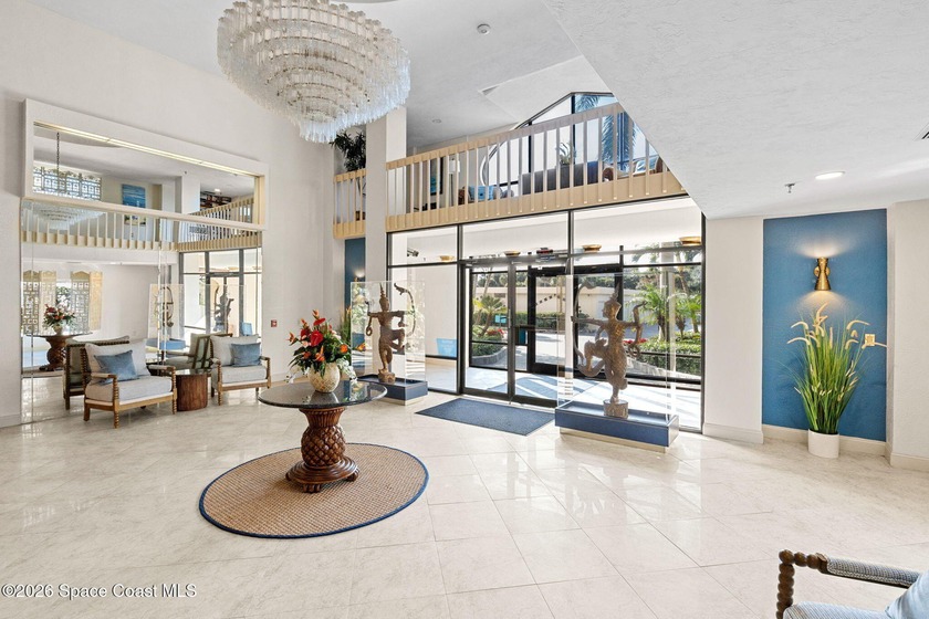 Discover the luxury of this 7th-floor corner oceanfront condo in - photo 4
