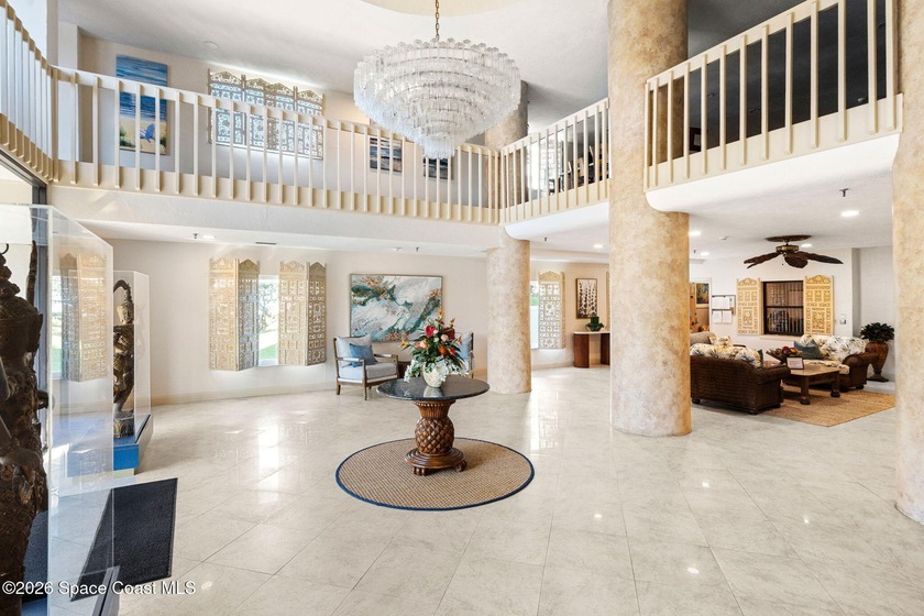 Discover the luxury of this 7th-floor corner oceanfront condo in - photo 5